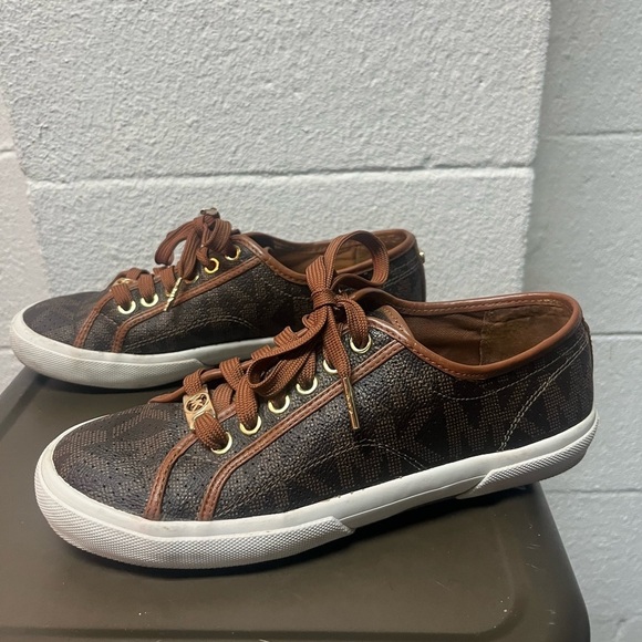 Michael Kors Shoes - Michael Kors Brown Sneakers with Gold Accents. Size 7